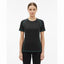 Woman wearing a black athletic shirt with green accents on a white background