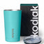 Turquoise tumbler with clear lid and Kodiak branding next to a black Kodiak box on a white background