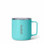 Turquoise mug with 'kodak' branding on a white background