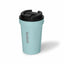 Light blue travel mug with black lid on a white background