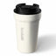 White tumbler with black lid on a white background, featuring the Kodiak brand.