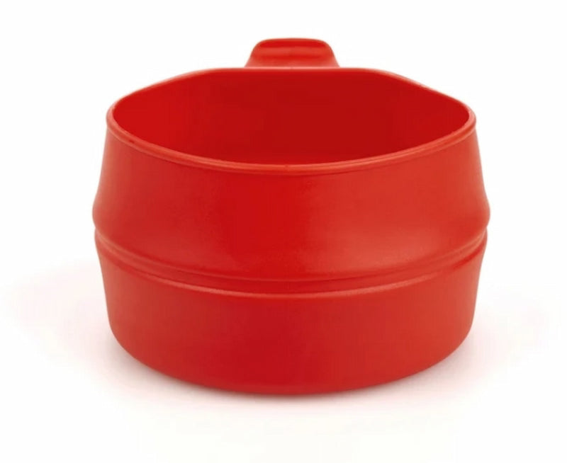 Red plastic funnel on a white background