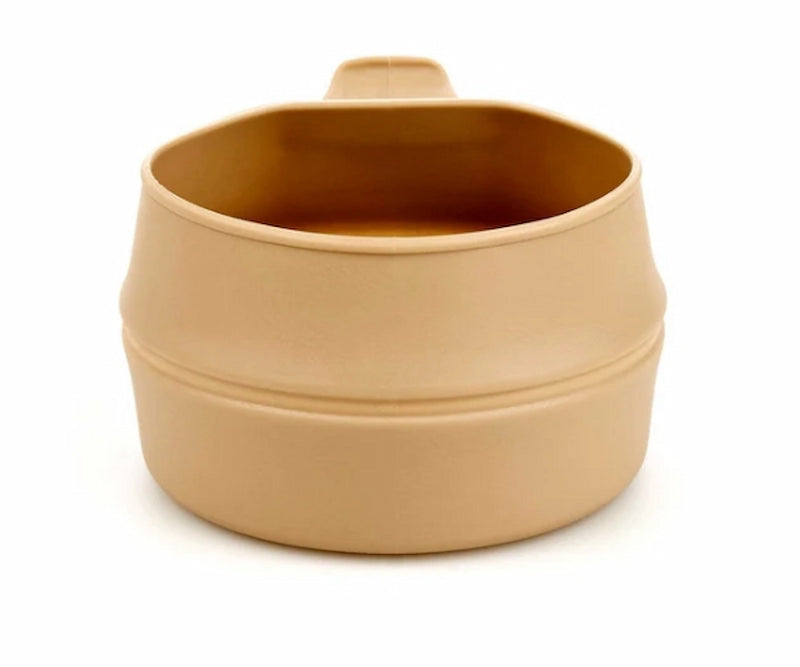 Beige ceramic mug with handle on a white background