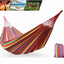 Colorful striped hammock with carrying bag on a white background