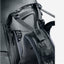 Close-up of a dark gray and black hiking backpack showing the hip belt, compression straps, and padded shoulder area with the Deuter logo.