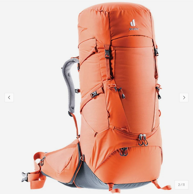 An orange Deerrun hiking backpack with gray shoulder straps and a gray hip belt, shown on a light gray background.