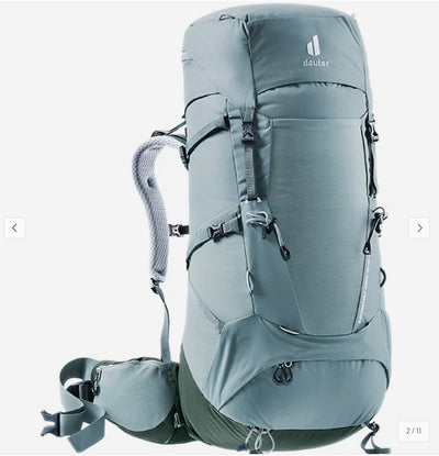 A large gray hiking backpack with multiple compression straps, a side pocket, and a visible Deuter logo on the top front, shown on a plain light background.