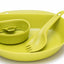 Green silicone utensil set including a bowl, spoon, and fork on a white background