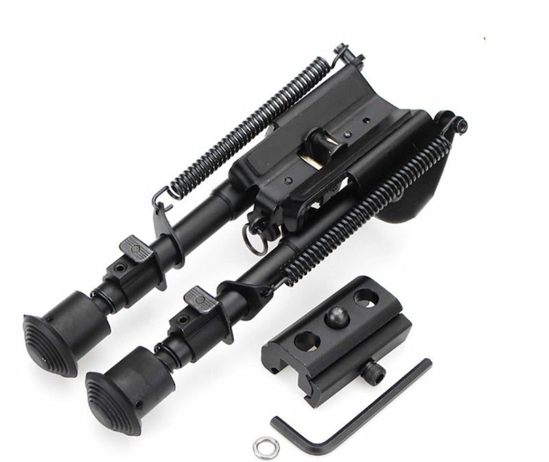 Black mechanical gun component set on a white background