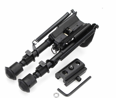 Black mechanical gun component set on a white background