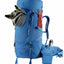 Blue hiking backpack with accessories on a white background