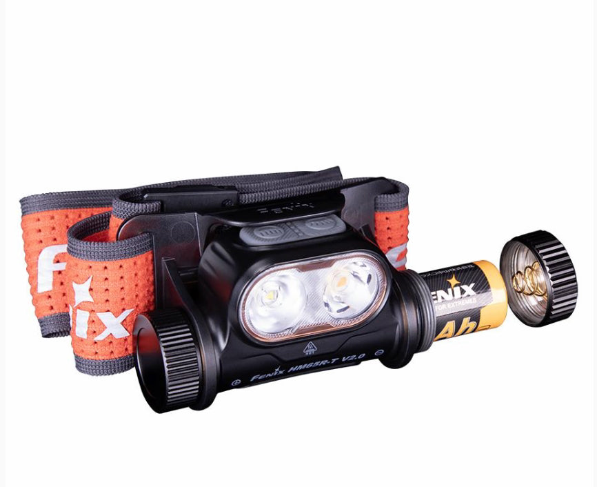 Headlamp with orange strap on a white background