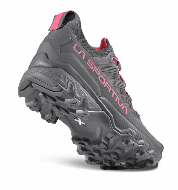 Gray hiking shoe with pink accents and 'La Sportiva' branding on a white background