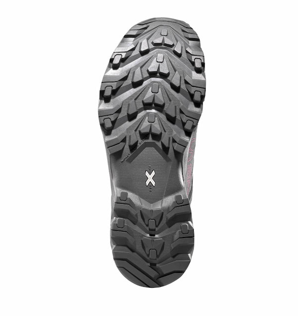 Close-up of a hiking boot sole with brand logo on a white background