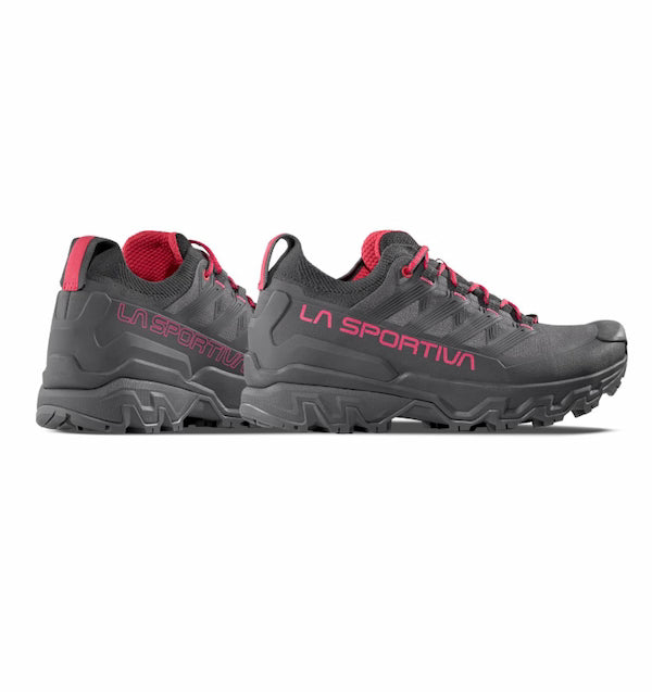 Gray hiking shoes with red accents and 'La Sportiva' branding on a white background