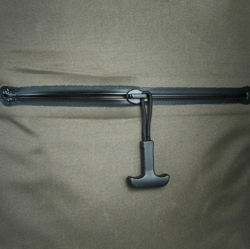Black metal rod with a hook on a gray fabric background