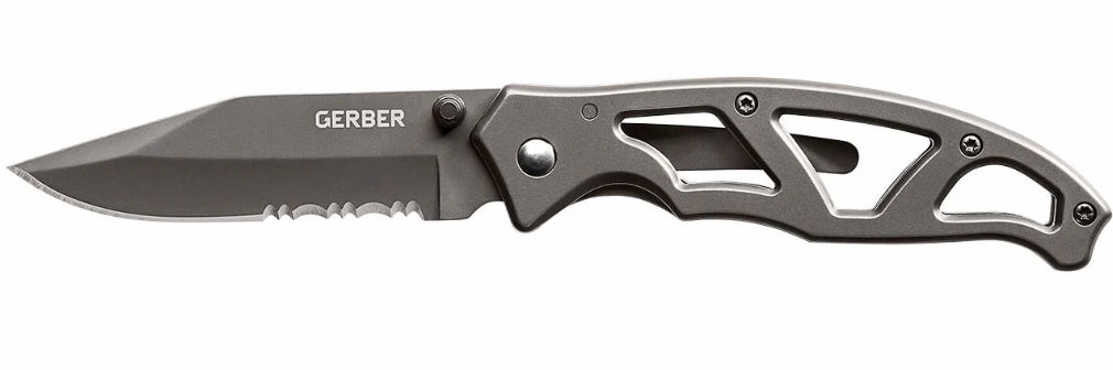 A Gerber folding pocket knife with a dark gray metal blade and a textured dark gray handle featuring cutouts, shown against a plain white background.