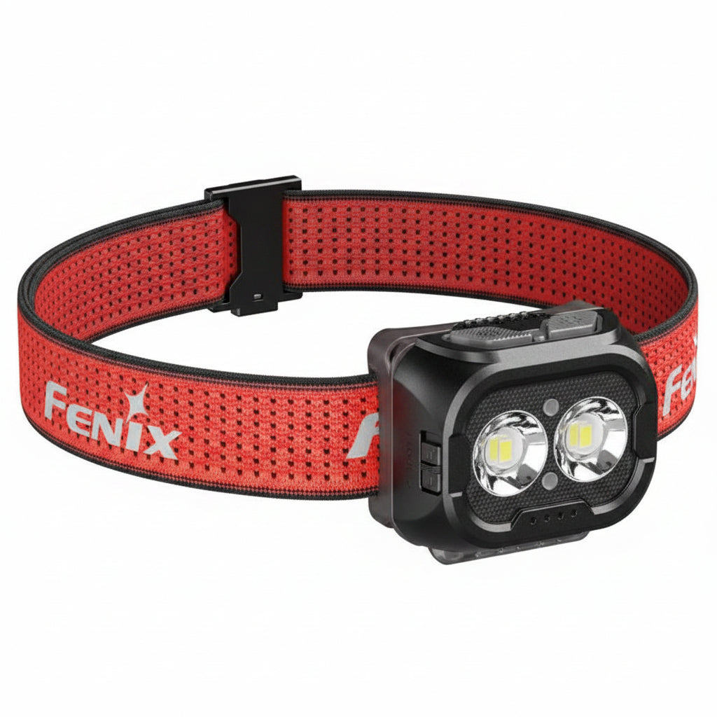 A Fenix headlamp with a red perforated fabric strap and a black adjustable housing, shown on a plain white background.