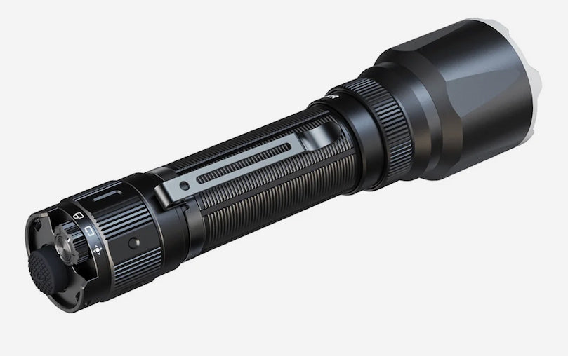 A black tactical flashlight with a textured grip and a ridged bezel, shown at an angle on a light gray background.