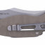a closed folding knife with tan handle on a white background