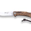 Folding knife with wooden handle and leather thong on a white background