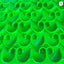 Close-up of green plastic clips with a pattern