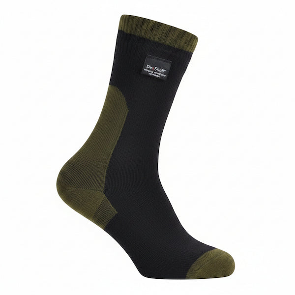 A single crew sock in black with olive green panels on the heel, toe, and ribbed cuff, featuring a small black brand label that reads 'Duck Stealth'.