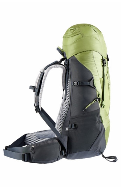 A hiking backpack shown from the side against a plain white background. The backpack features a light olive green top section and a dark gray lower section, with gray mesh padding on the shoulder straps.