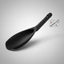Black ladle with a label on a gray background