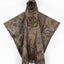 A hooded rain poncho with a woodland camouflage pattern featuring brown branches, green leaves, and beige/tan foliage, displayed against a plain white background.