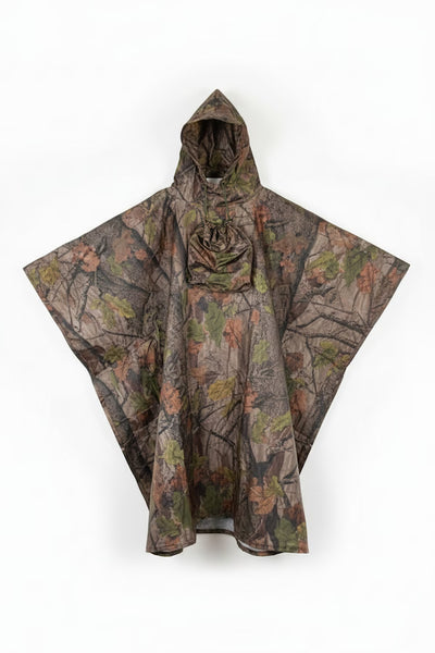 A hooded rain poncho with a woodland camouflage pattern featuring brown branches, green leaves, and beige/tan foliage, displayed against a plain white background.