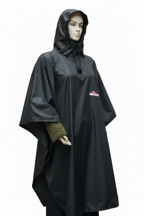 A mannequin wearing a black hooded rain poncho with a small red and white logo patch on the chest, shown against a plain white background.