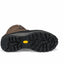 Close-up of a brown boot sole with a yellow label on a white background
