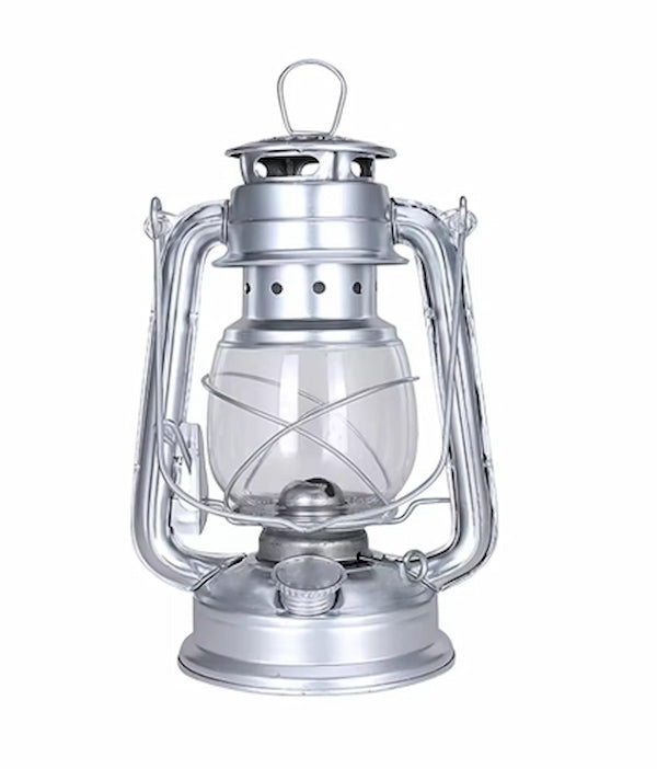 Silver lantern with clear glass on a white background