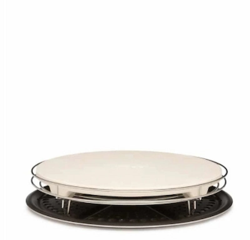 Round ceramic plate with a black base on a white background