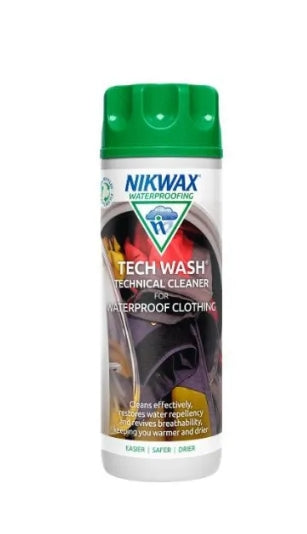 A bottle of Nikwax Tech Wash technical cleaner for waterproof clothing, with a green cap and label featuring the brand logo and product information.