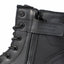 Close-up of a black leather lace-up boot with a side zipper, pull tab, and a strap across the ankle featuring the embossed brand name HUNTA.