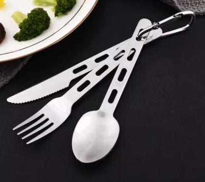Set of silver cutlery with a carabiner on a black surface