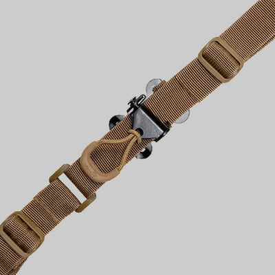 Brown tactical belt with a black buckle on a light gray background
