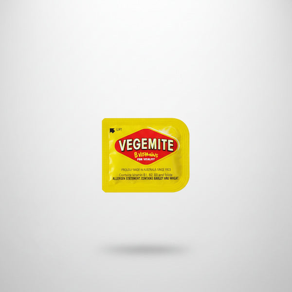 Vegemite container on a white background