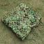 Camouflage net on grass
