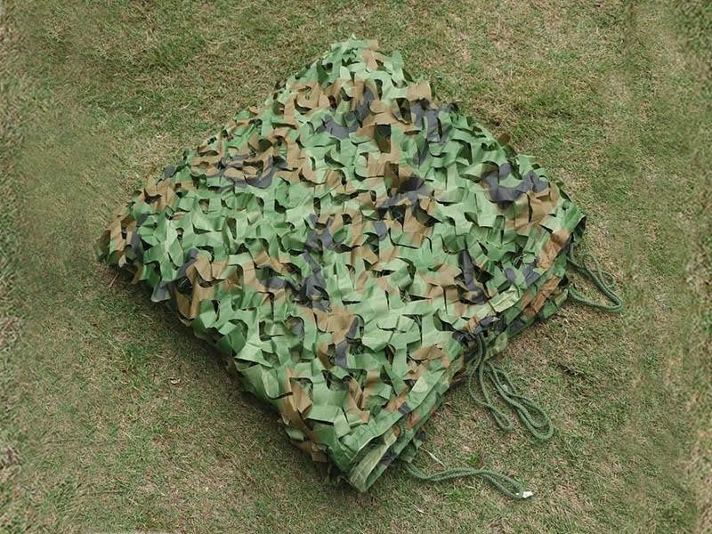 Camouflage net on grass