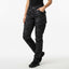 Person wearing black camouflage pants on a white background