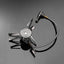 Portable camping stove with hose on a gray background