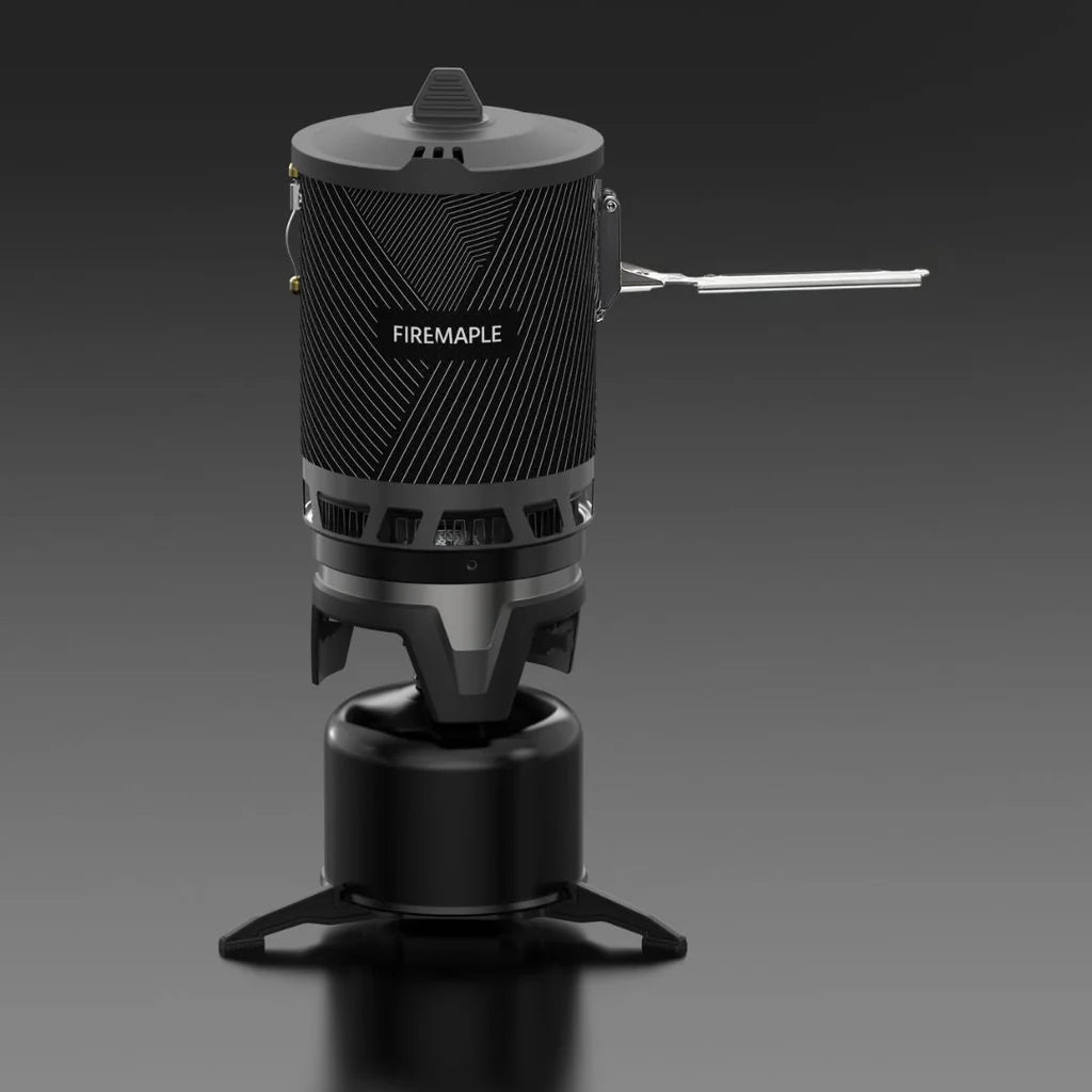 Black portable stove with 'Firemaple' branding on a dark background
