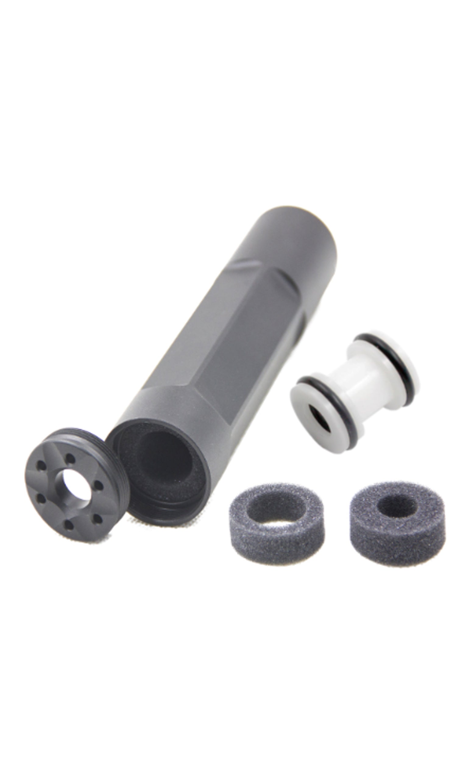 An airsoft suppressor with barrel spacer and additional parts, primarily in black color.