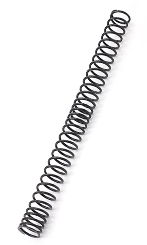 A black metal coil spring for an airsoft gun, isolated on a white background.